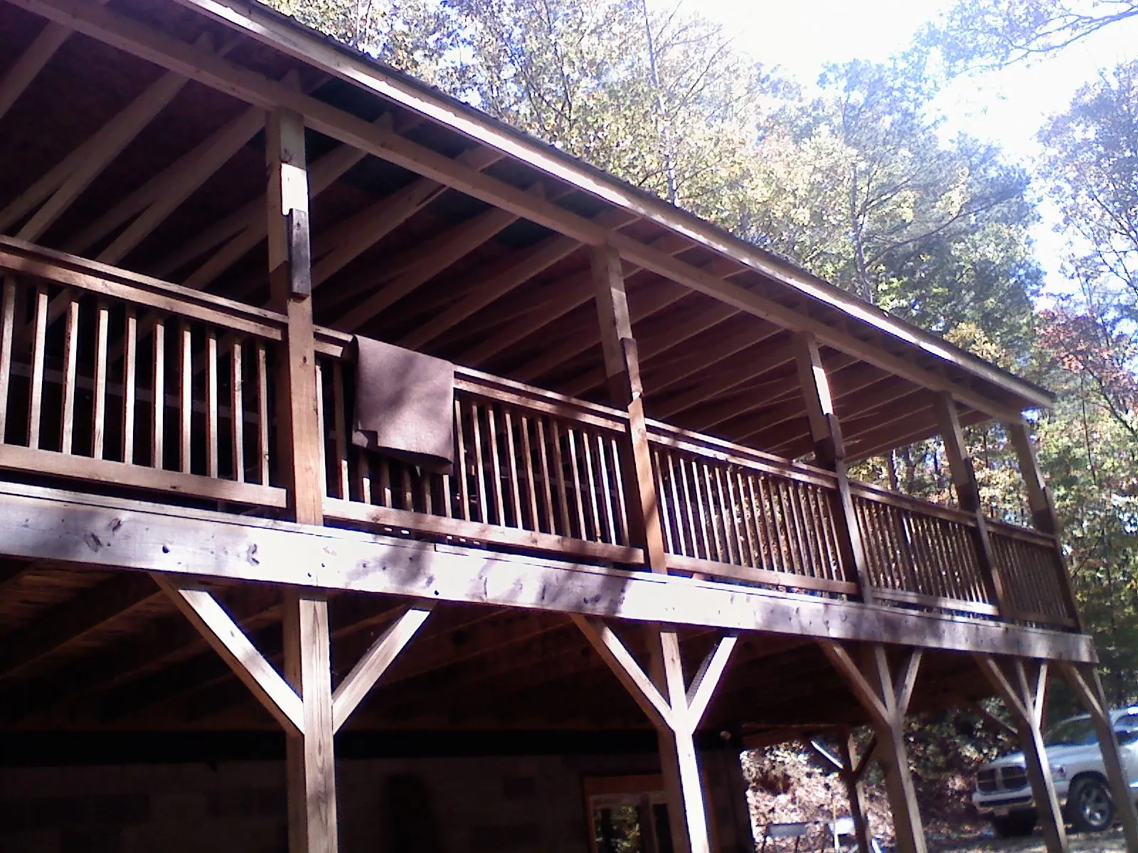 Timber framing under a new elevated porch and deck — Roof Leak Repair in Loxahatchee by Roofing Brothers